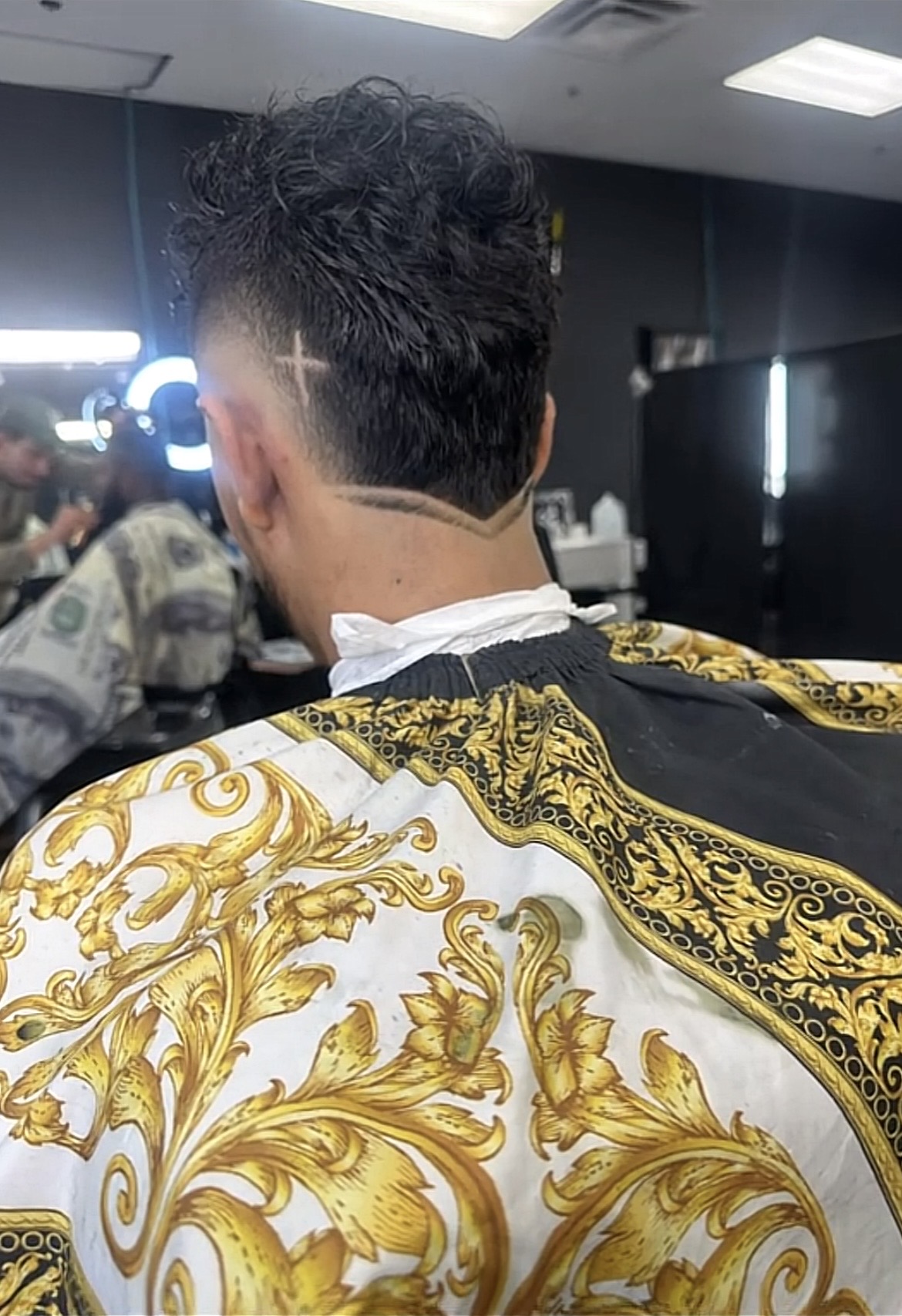 Detailed neckline design and fresh fade